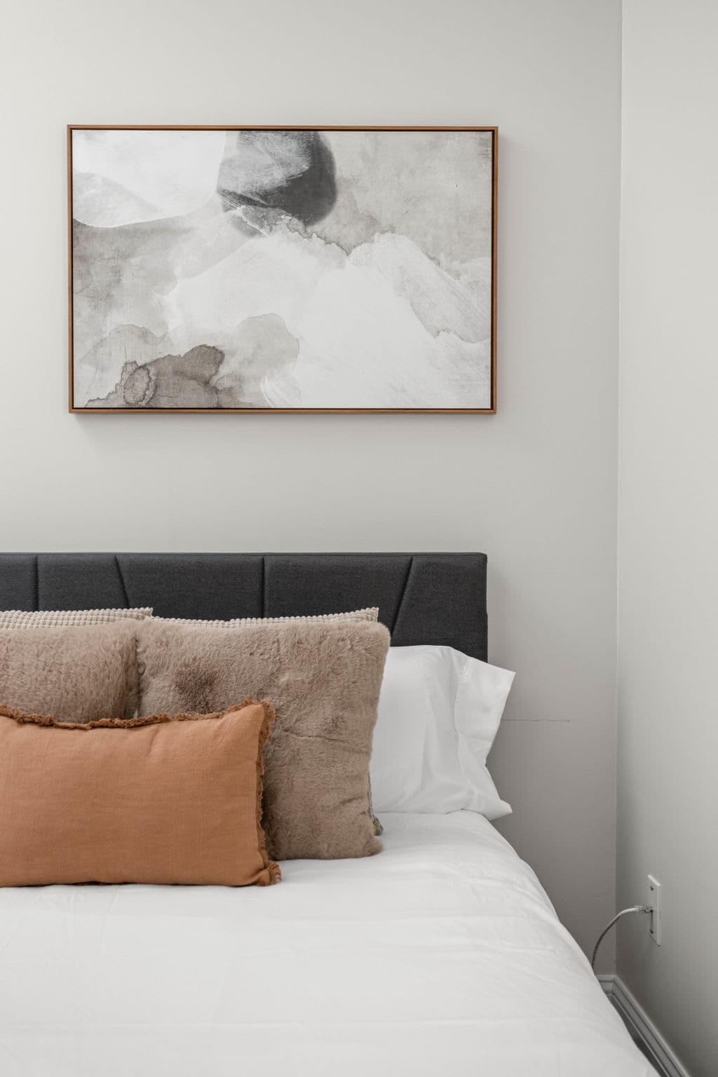 Elevate your bedroom ambiance with our unique abstract painting, adding a touch of artistic flair to the decor.