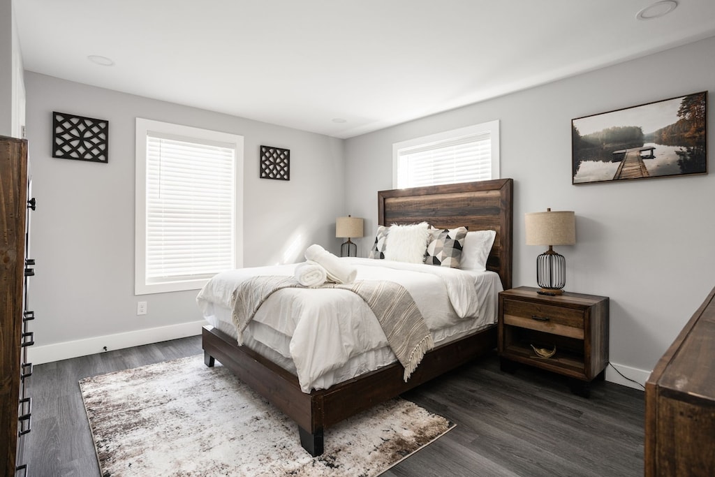 Bedroom Retreat: Bright space with plush bedding, decorative accents, and modern amenities await!