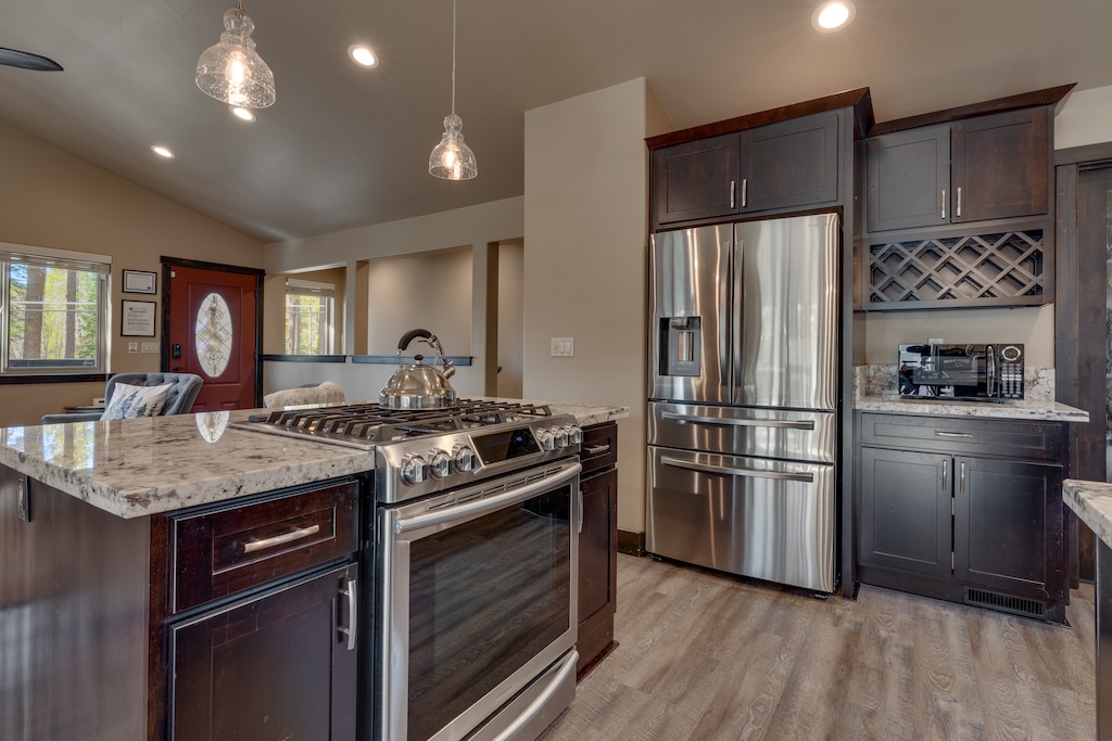 Kitchen area with stainless steel appliances