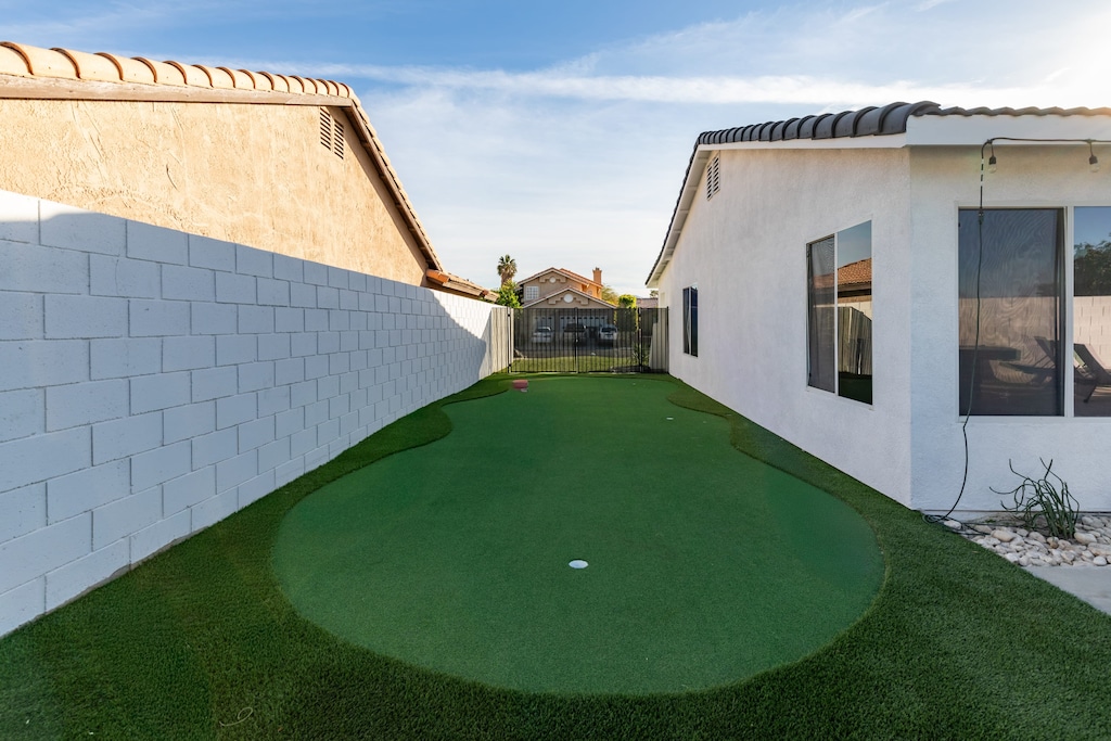 Practice your swing and perfect your game on the private putting green.