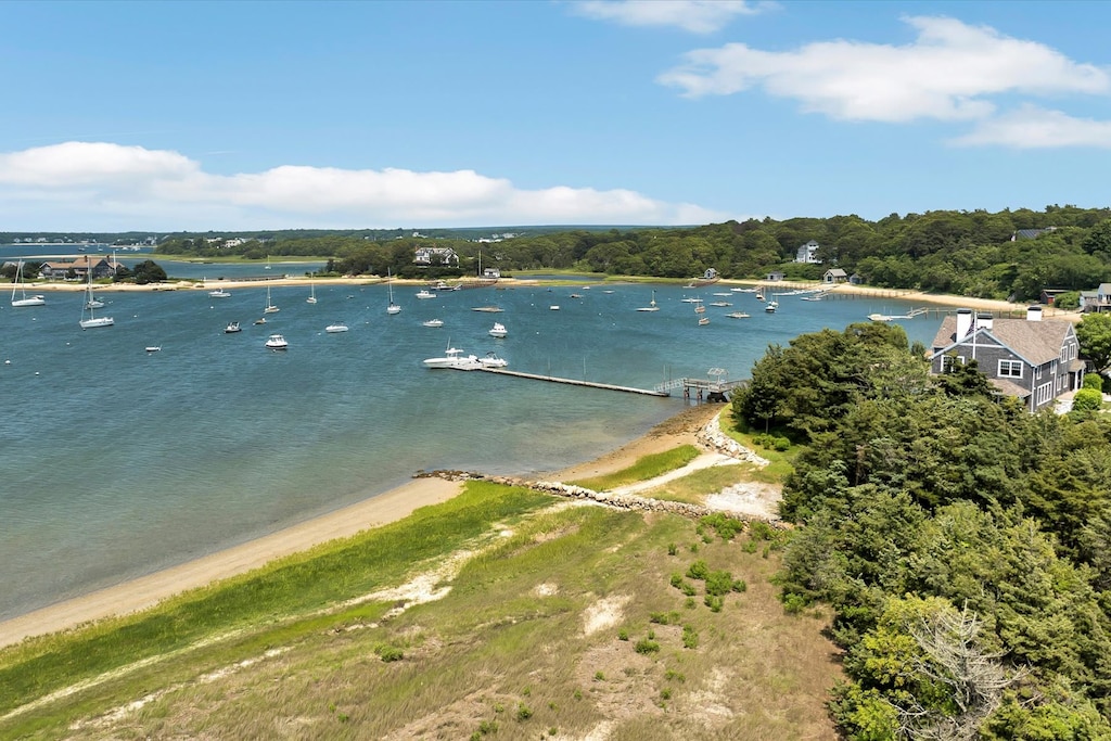 Soak in the scenic beauty of the protected bay on Scraggy Neck. Please note: the beach is not directly outside the home, but access is included with your stay.