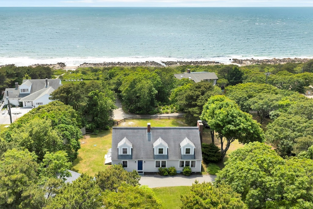 Wake up to ocean breezes and a front-row view of Buzzards Bay—just a short stroll from your back gate.