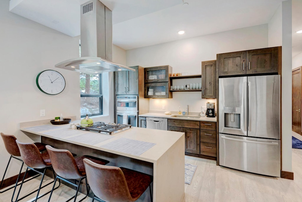 Kitchen with large counter bar area for 4