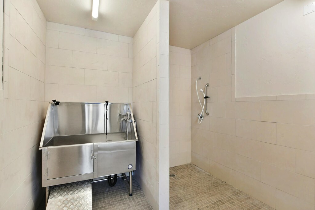 Guests Visiting with Dogs Can Access a Fully Equipped Dog Wash Room.