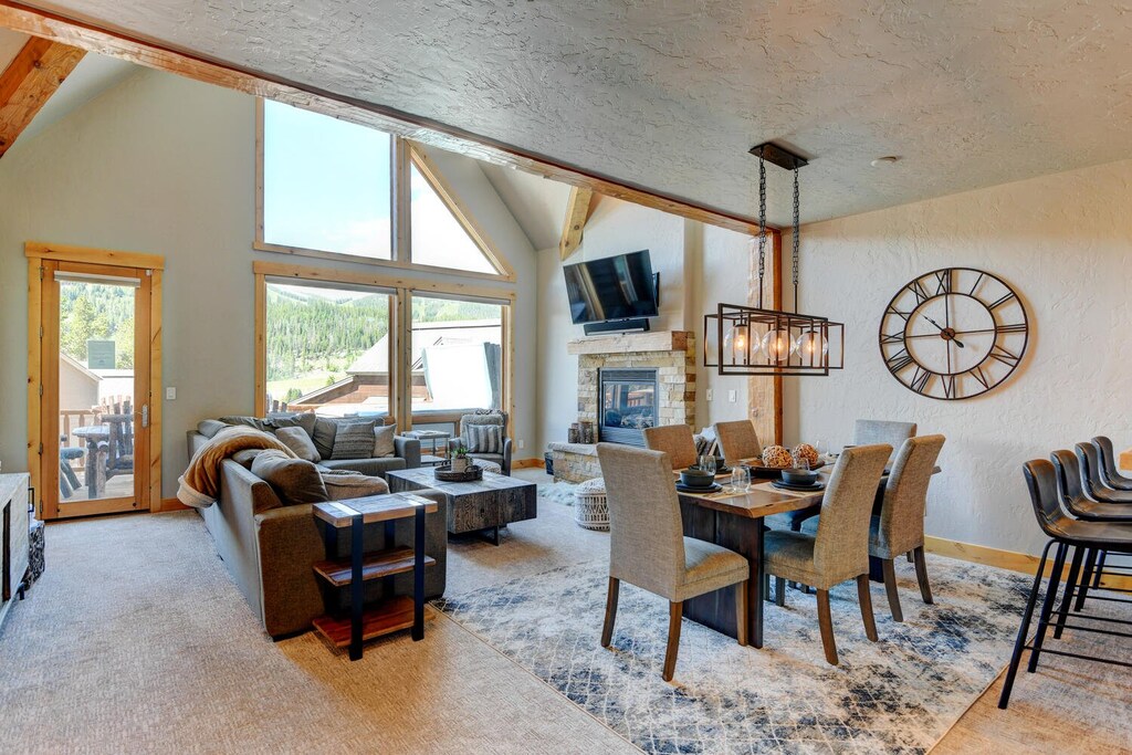 Custom Wood Finishes and Lighting Throughout