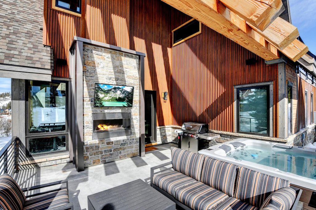 Back Patio with Private Hot Tub, Seating Area, Fireplace and Exterior TV