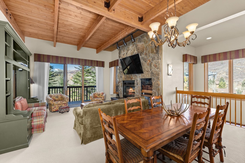 Step into your mountain sanctuary where soaring wooden beams frame breathtaking views and a crackling stone fireplace beckons you to unwind after a day of adventure.