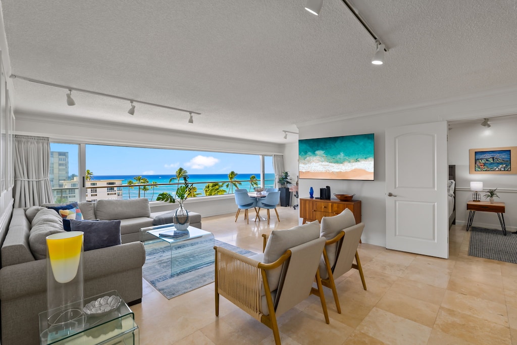 Spacious and modern living area with seamless indoor-outdoor flow for a tranquil retreat.