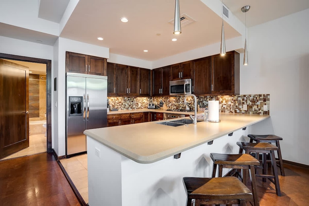 Kitchen with bar-style seating