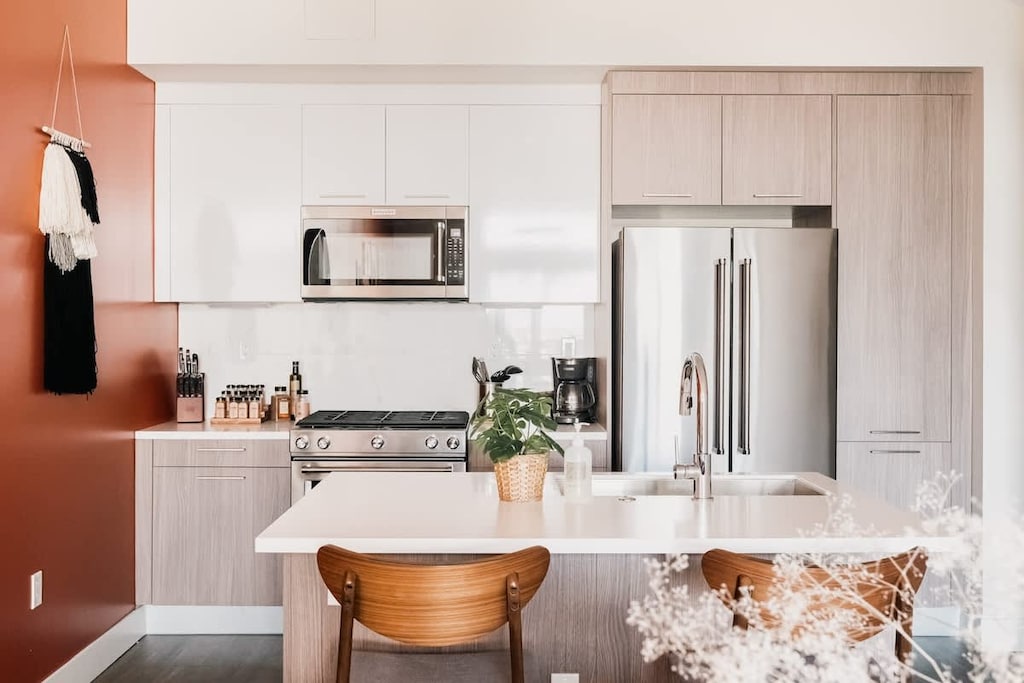Kitchen with island and bar seating