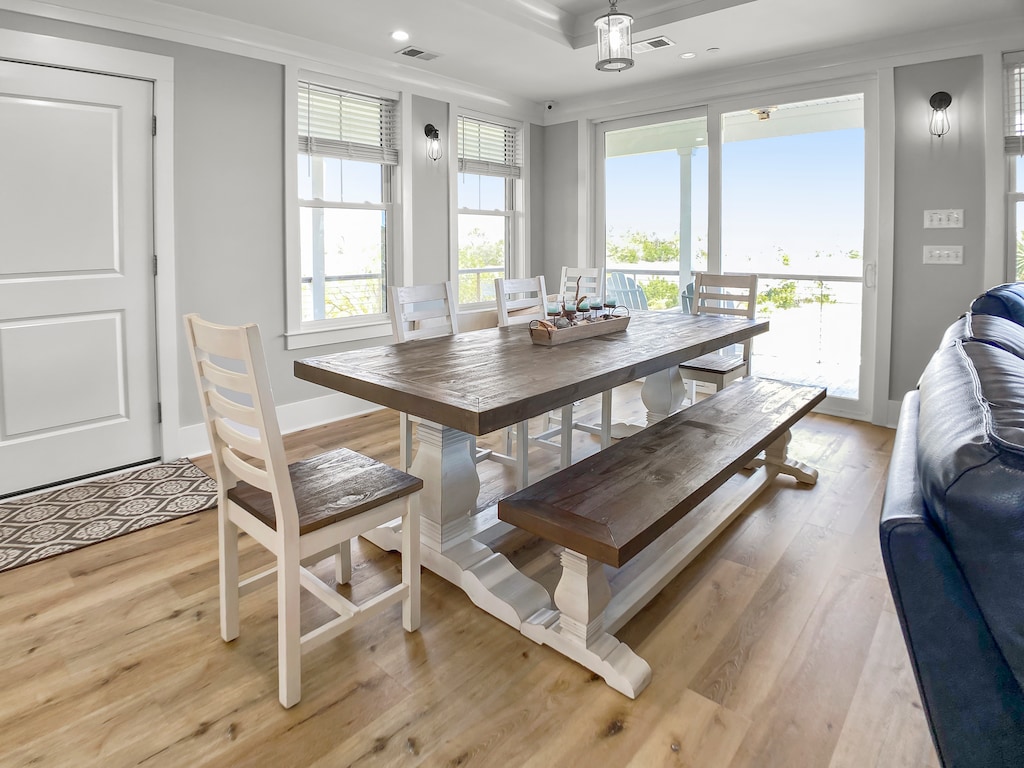 Dining for 8 overlooking the marsh and private yard