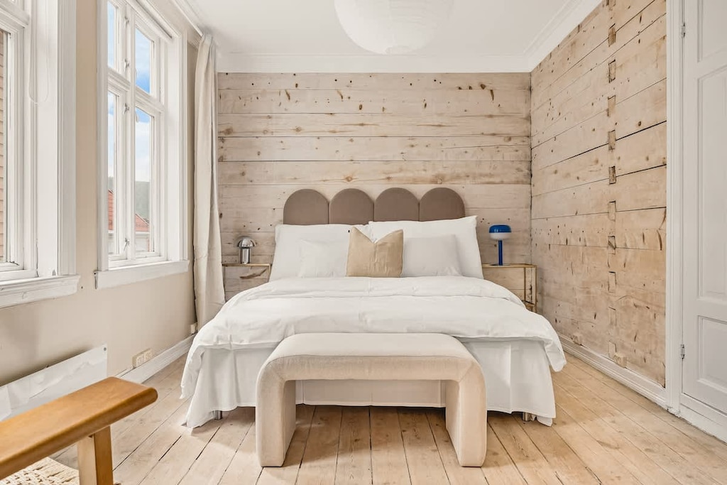 The bedroom of your dreams is just one of the many unique features of this house. It boasts a super comfortable king-size bed, blackout curtains, a coffee and tea station, and a cozy lounge chair. You'll also have easy access to the full bathroom rig