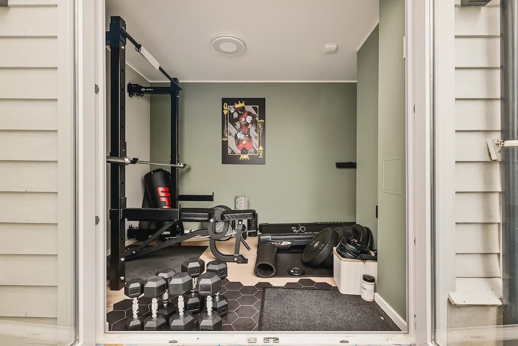 The gym is available 24/7 and includes dumbbells, a treadmill, a squat rack, and much more for core training!