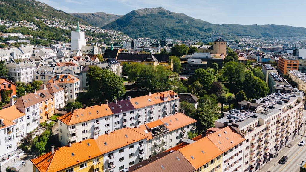 A drone's-eye view of a busy city street.