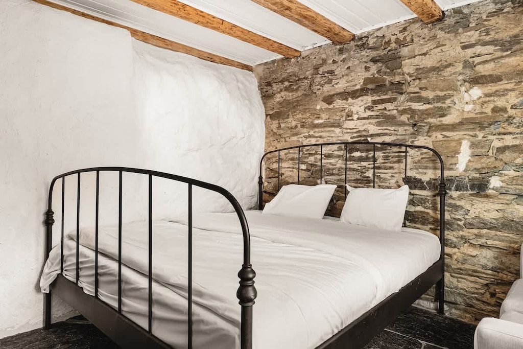 This bedroom is downstairs in the apartment; surrounded by stone walls dated back to the 1800s! | Bedroom 2 | 180cm bed