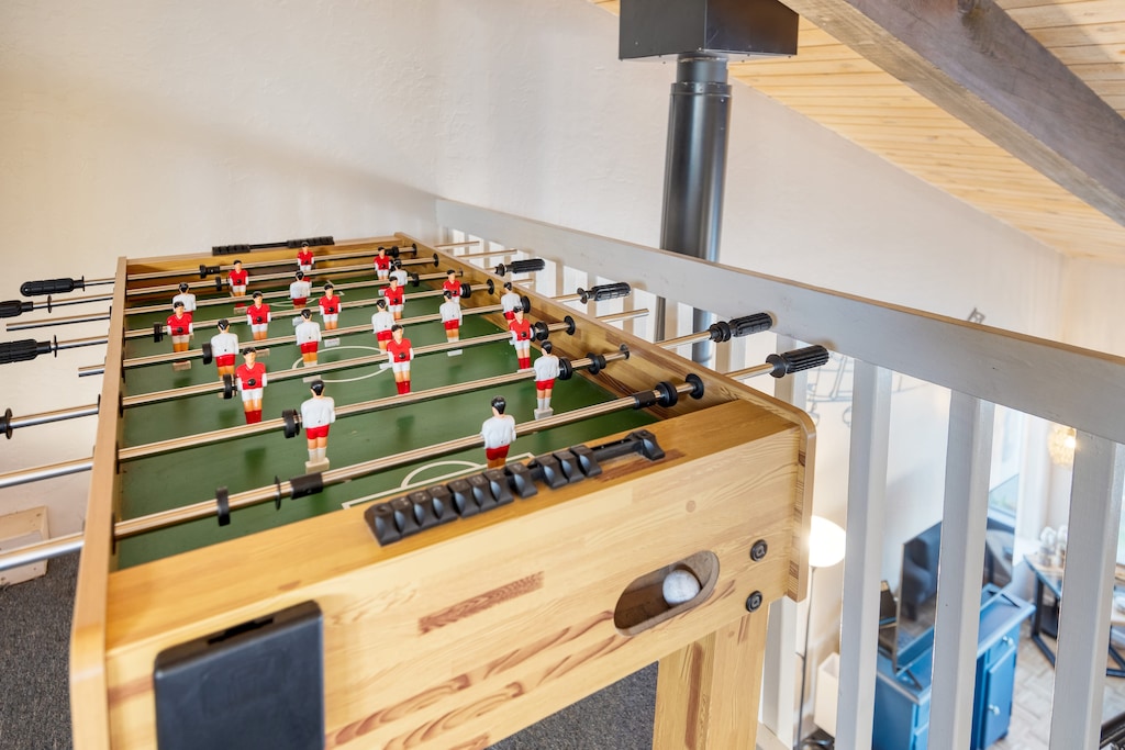 Loft features a foosball table.