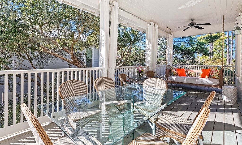 2nd floor balcony with outdoor dining and seating