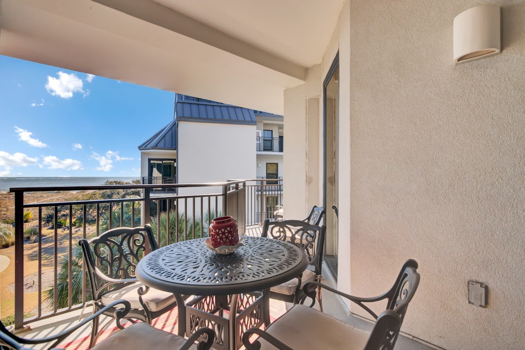 Outdoor dining area on the balcony.