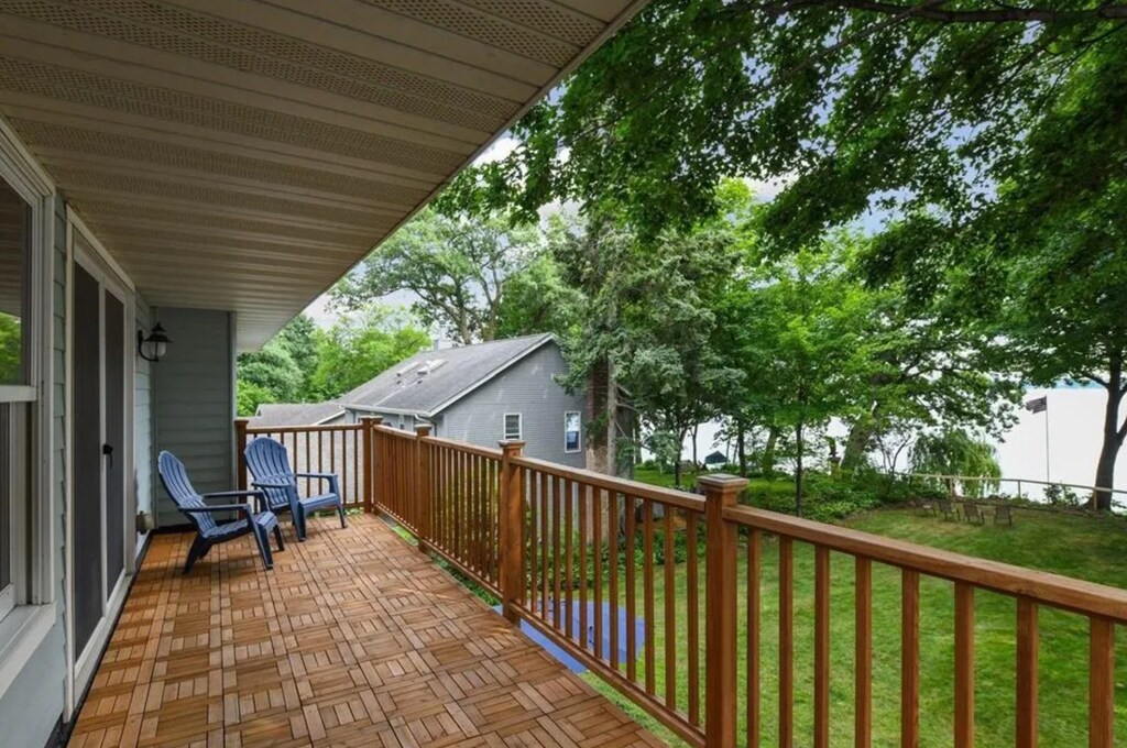 Step onto your private deck and unwind in comfortable chairs while taking in the peaceful tree-lined neighborhood views.