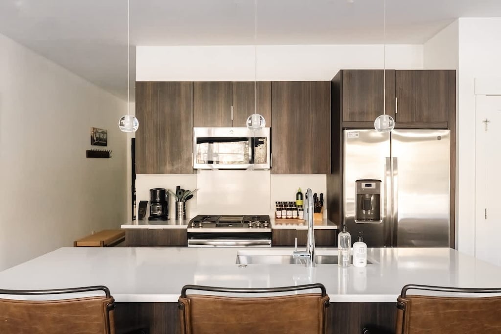 Open kitchen with island bar-style seating