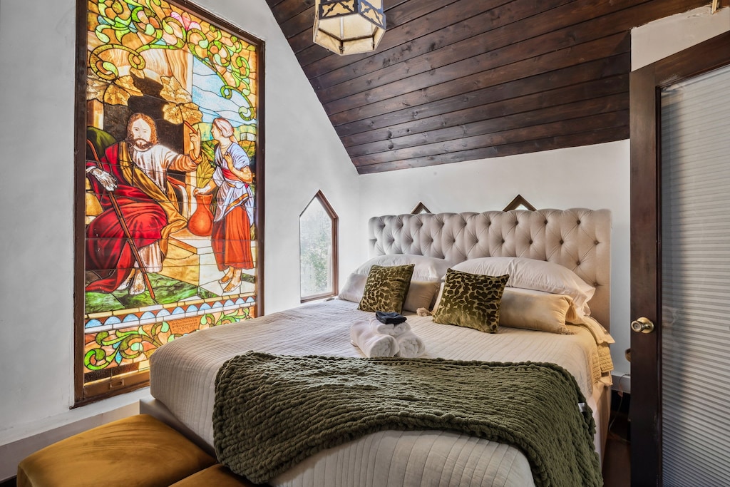Wake up in luxury beneath a stunning stained glass masterpiece – a unique blend of history and comfort.