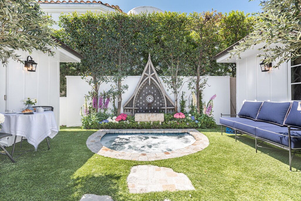A serene private courtyard designed for lingering afternoons, slip into the in-ground jacuzzi for a luxurious soak