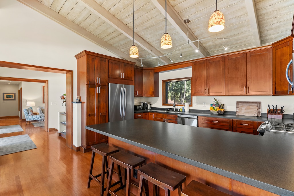 A spacious kitchen with modern appliances and a large island for easy meal prep.