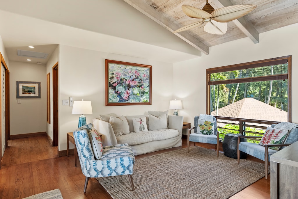 Relax in the cozy sitting area with natural light and ocean breezes flowing through the windows.