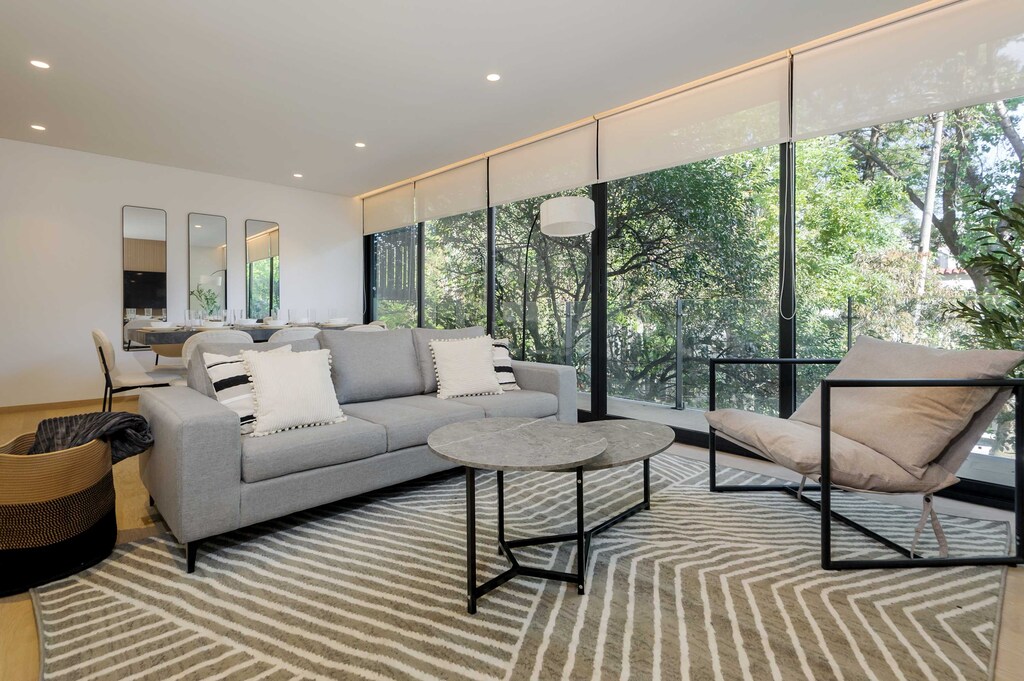 Spacious living room and balcony access