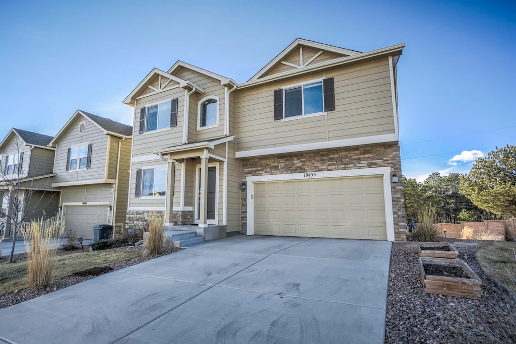 Spacious front view with a wide driveway offering ample parking for your stay.





