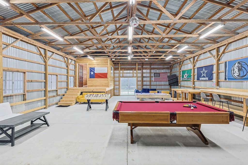 We know how to take entertaining to the next level! This game room features foosball, air hockey, and pool plus a massive TV and plenty of sitting space!