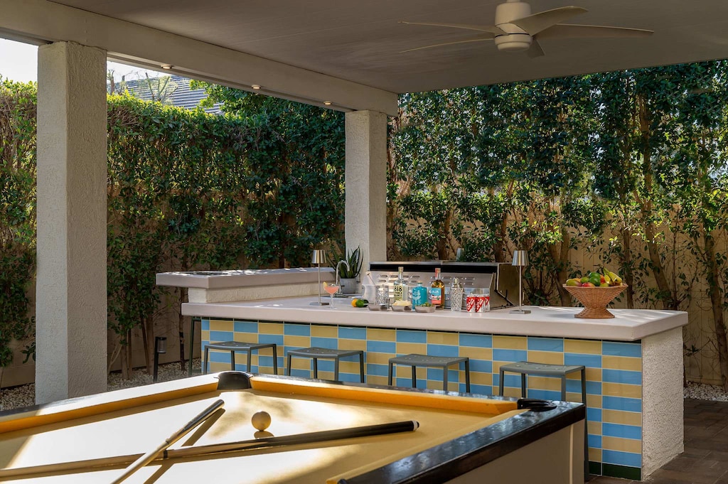 Billiards table and outdoor grilling area