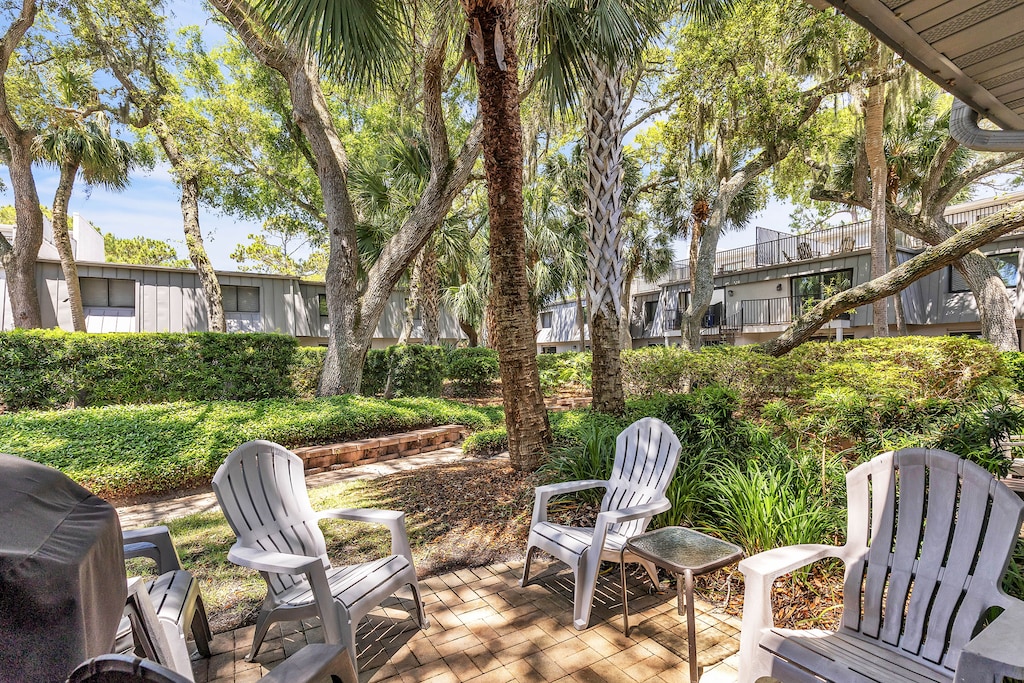 Private Patio Next to Community Pool and Walk to Beach