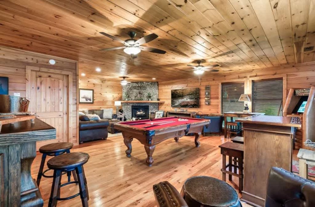 Welcome to our game room—where fun meets relaxation! Enjoy the pool table, board games, and a cozy lounging area by the fireplace.