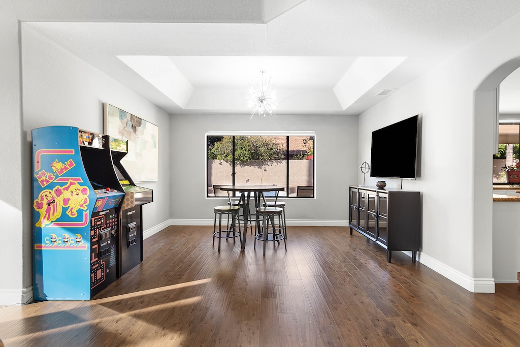 Dive into some competitive play on the two arcade machines, or enjoy a friendly card game at the high-top game table!