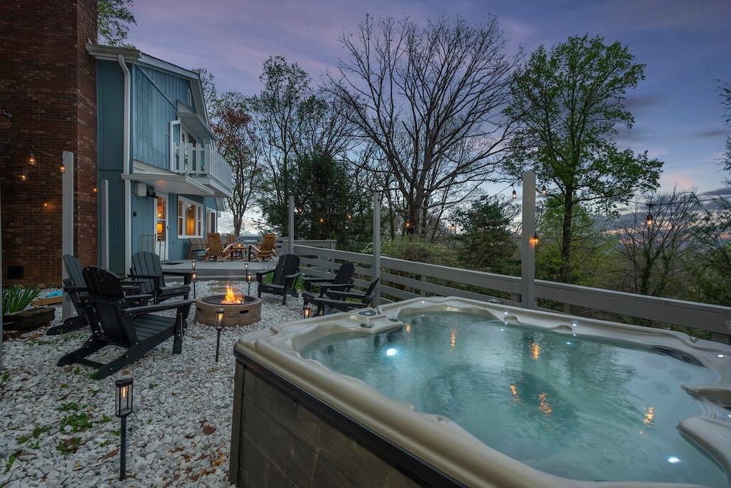 Sit back and relax by the fire pit and hot tub