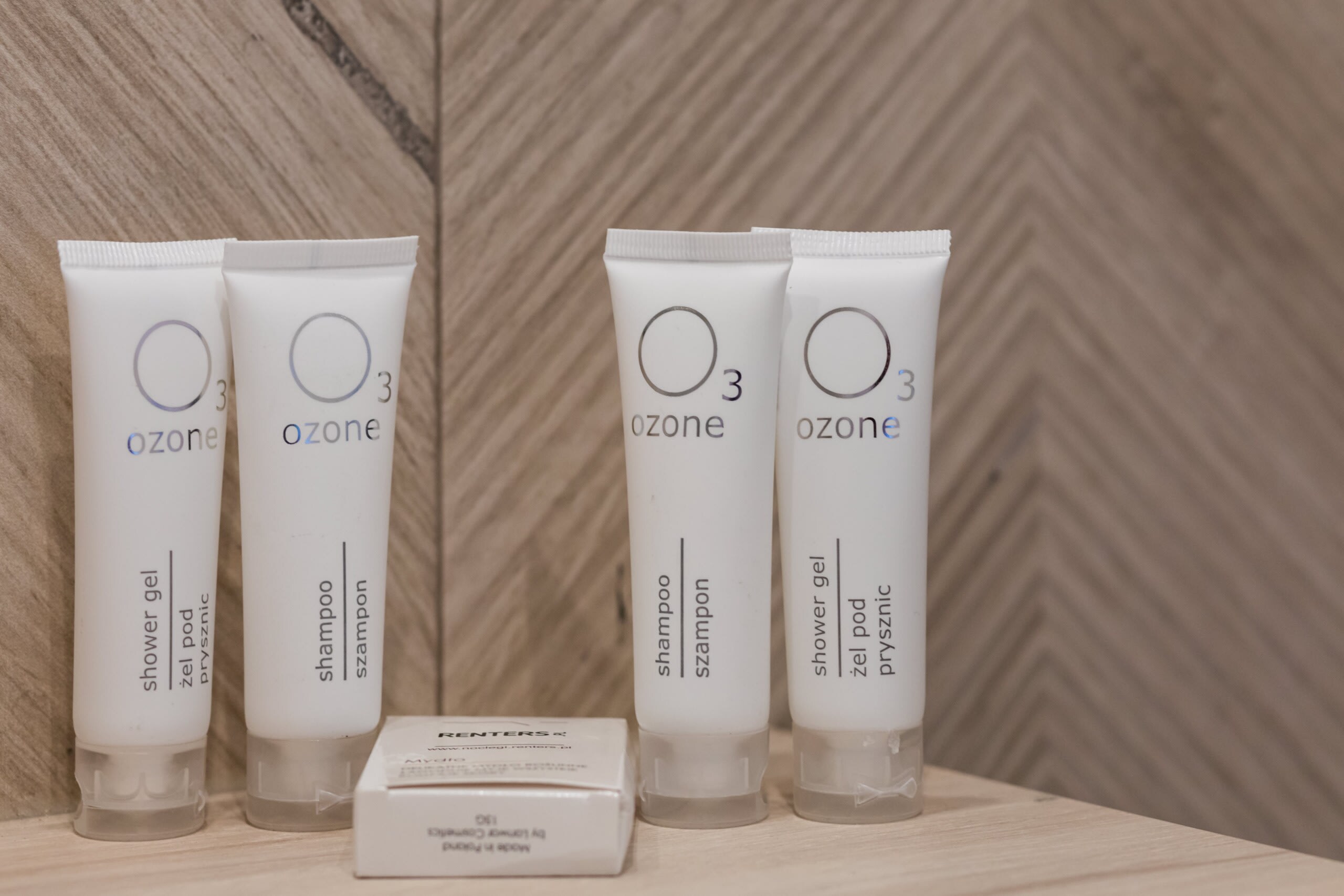 A set of complimentary toiletries in the bathroom.