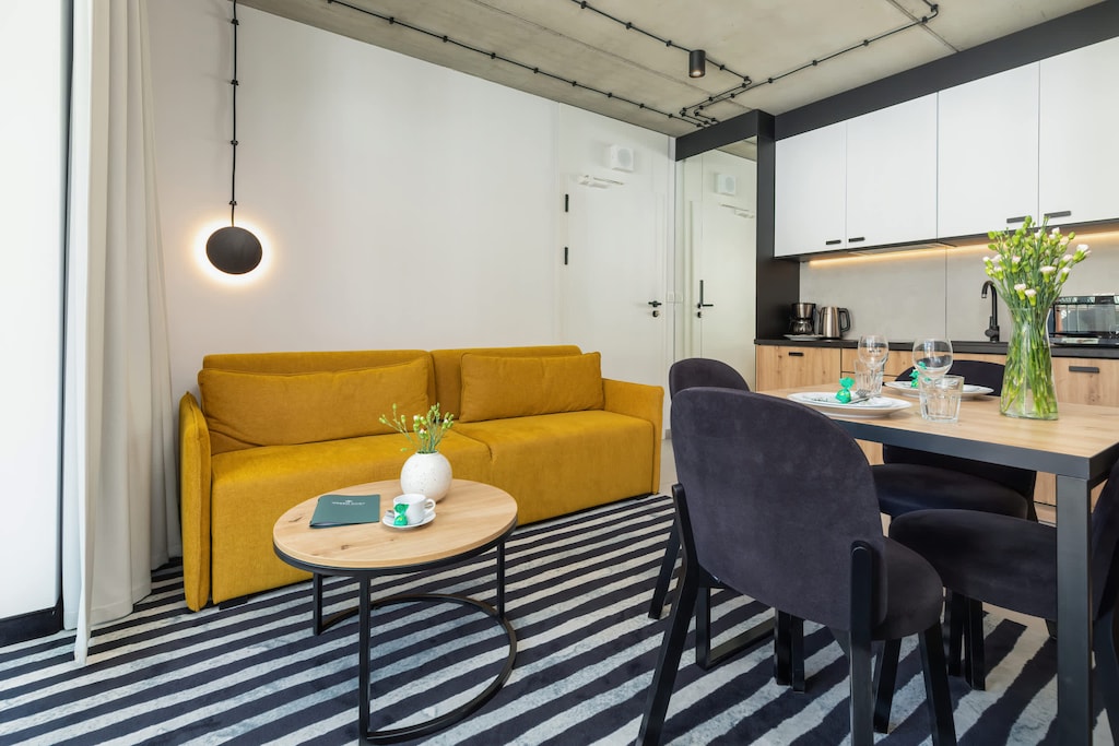 Living room with a comfortable sofa and TV. 
