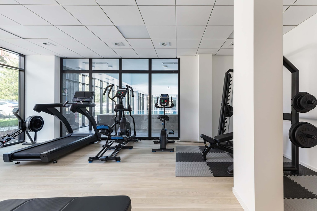 Gym with modern exercise equipment.