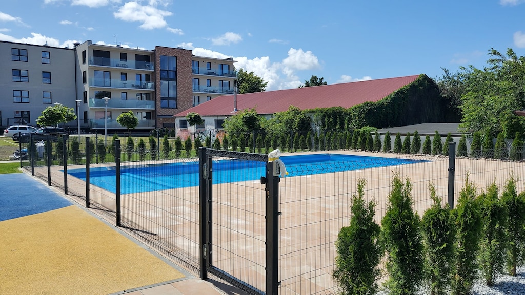 Neighbourhood with swimming pool access for guests.