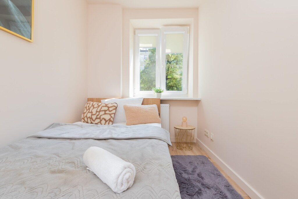 A comfortable single bed in the bedroom.