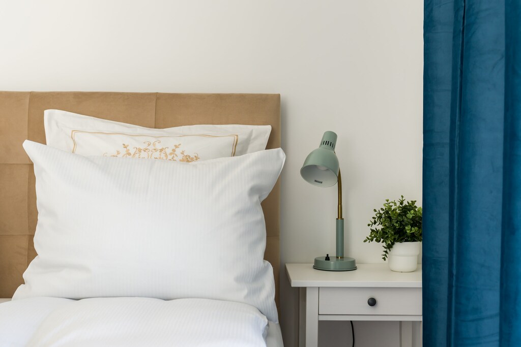 Comfortable double bed in the bedroom. 