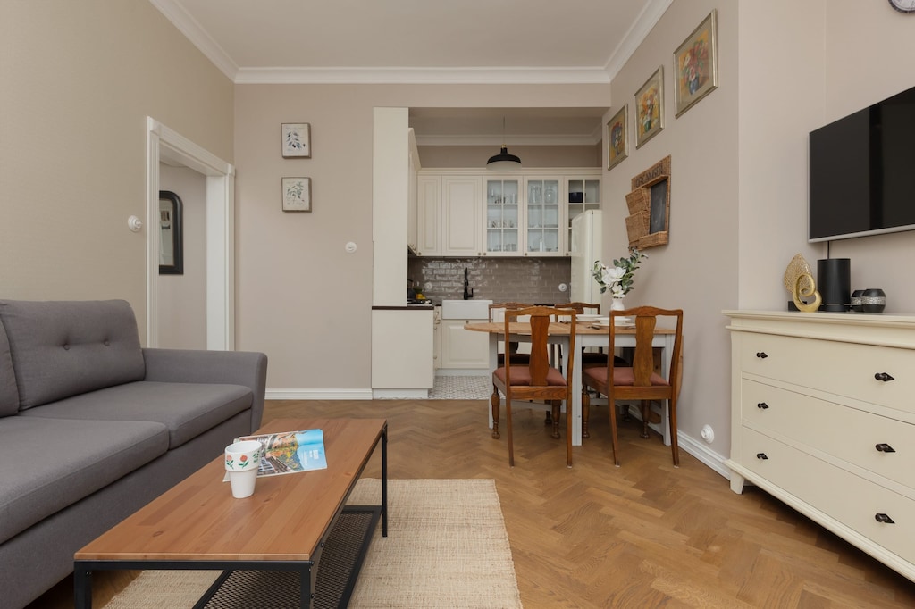 A stylish combination of the living and dining areas, providing a comfortable and functional space.

