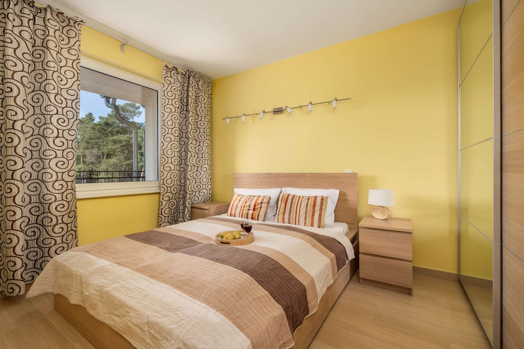 Cozy bedroom in the apartment. 
