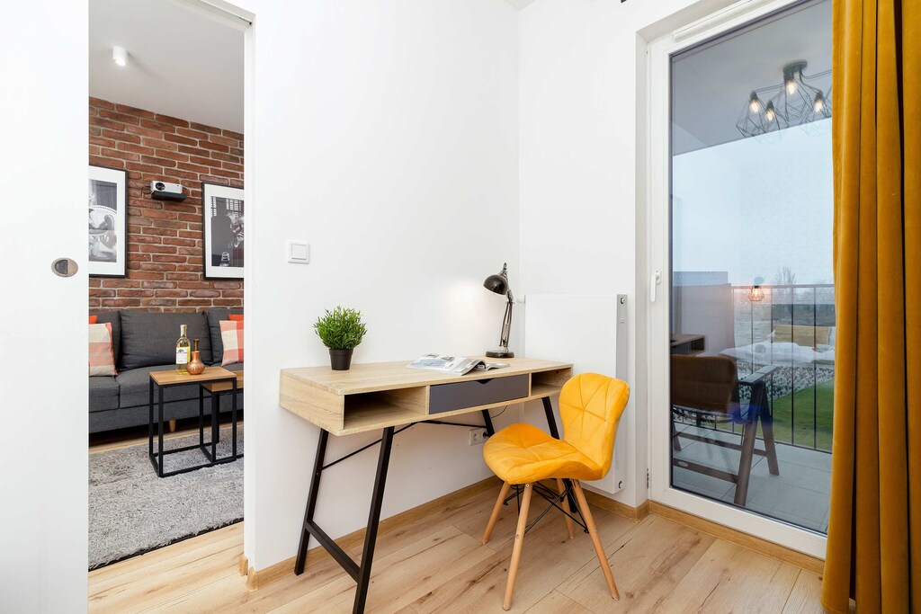 Desk with a chair for remote work in the bedroom.