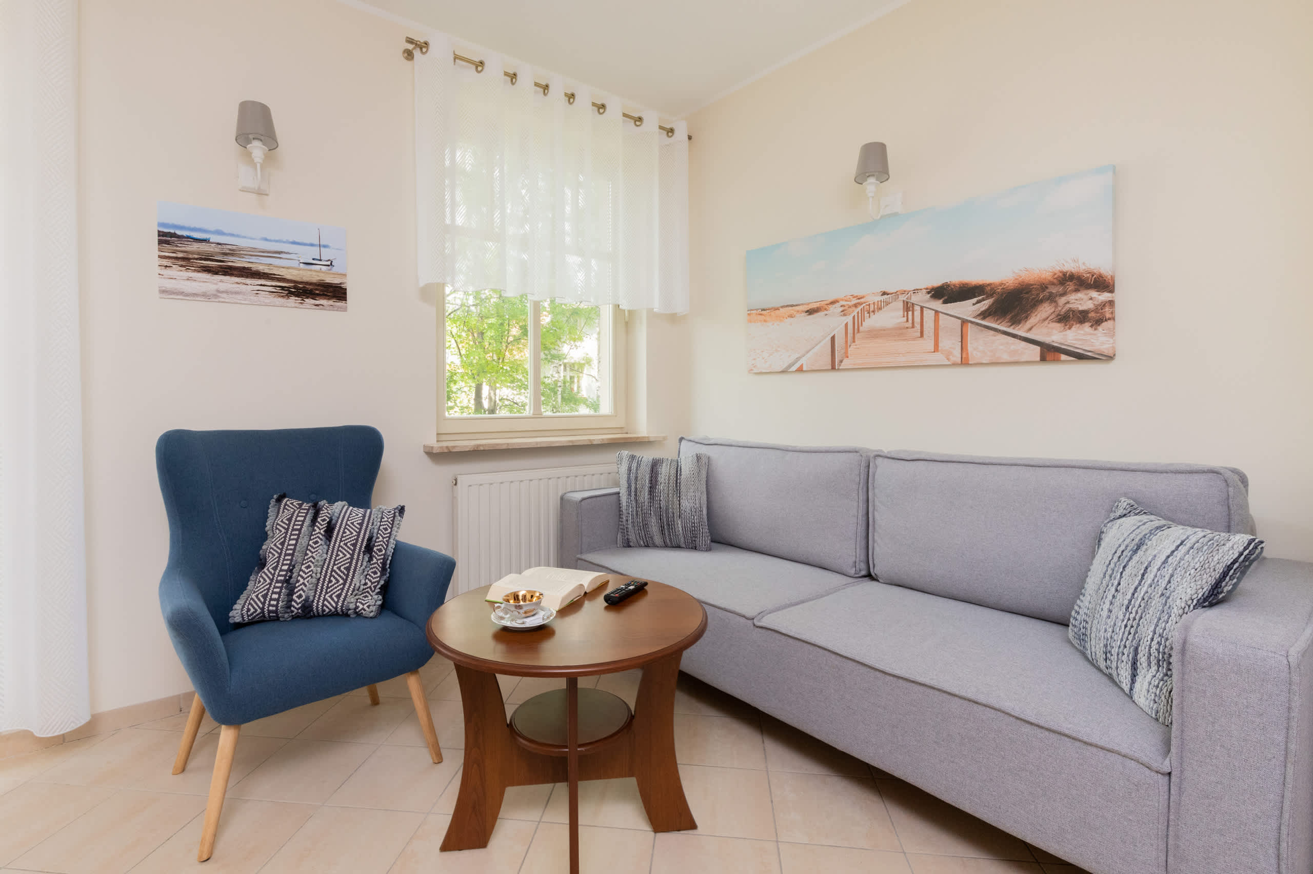 Living room with a comfortable sofa and TV. 