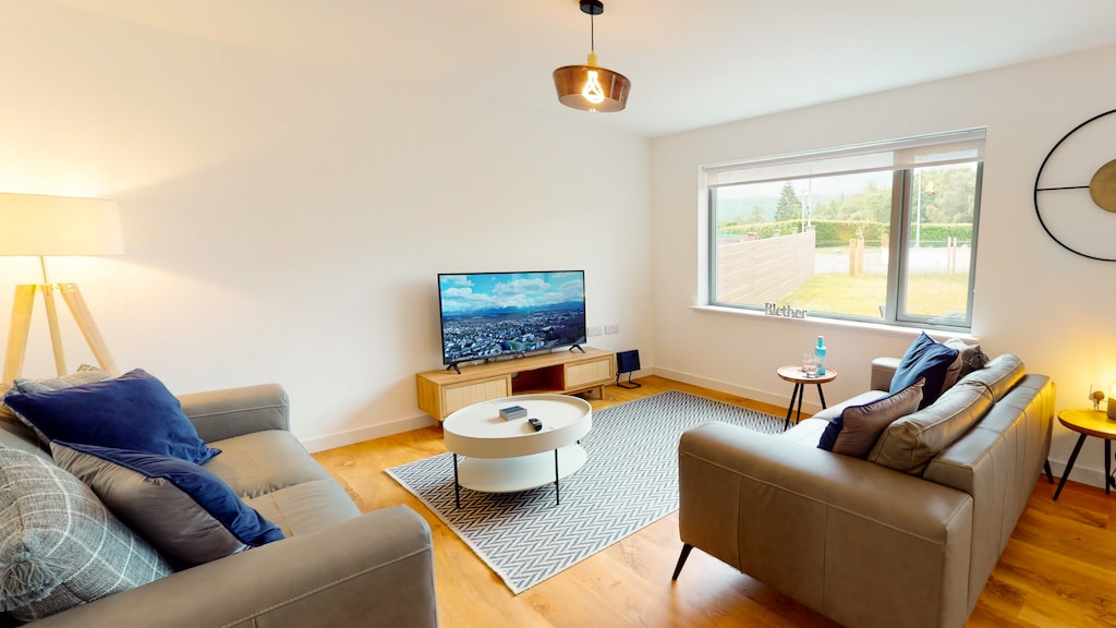 Relax in the modern living room with smart tv and super fast wifi