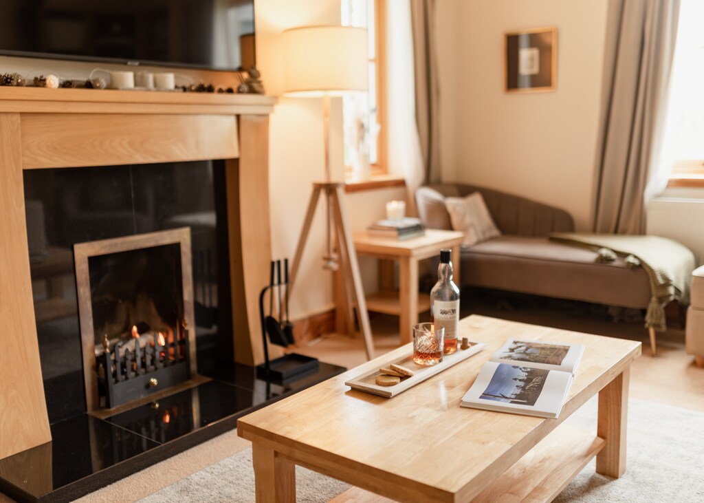 Relax in the lounge in front of real fire