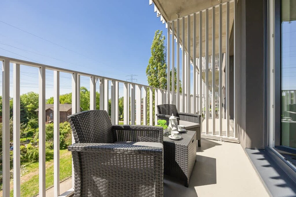  Private balcony with a view — enjoy morning coffee or evening wine.
