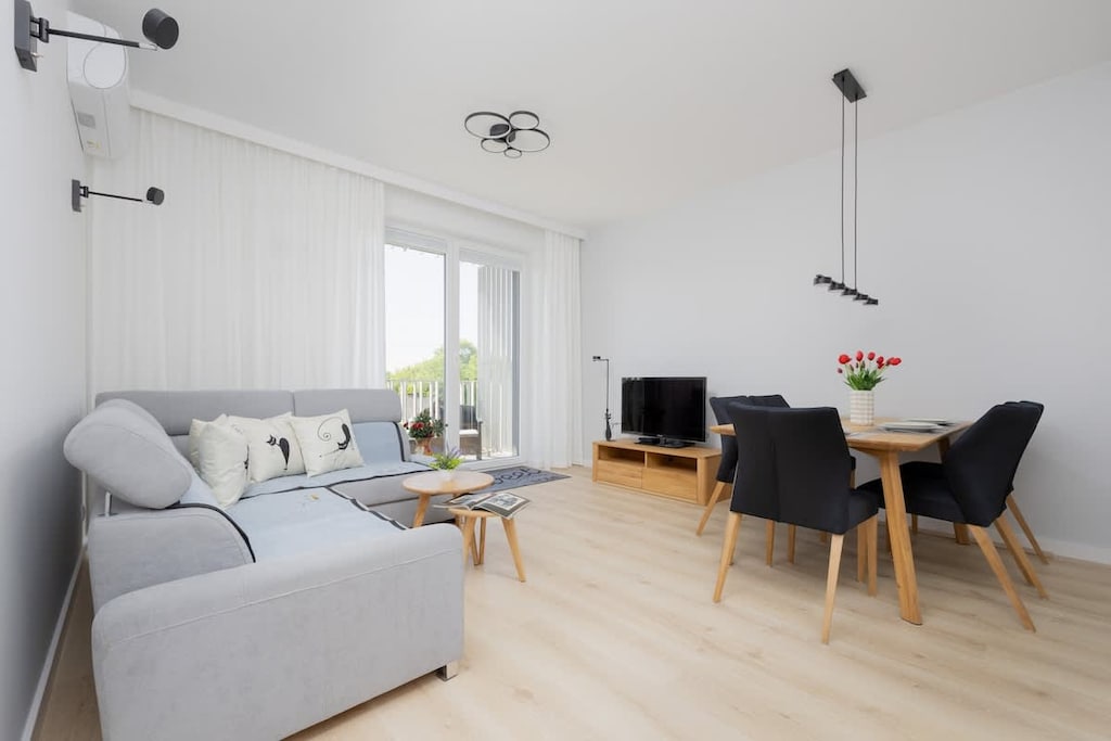 Open-plan lounge with a relaxing ambiance and smart TV.